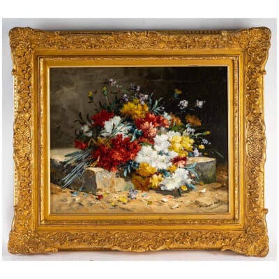 Henri Cauchois (1850 – 1911) : Bouquet d’oeillets sur un entablement.