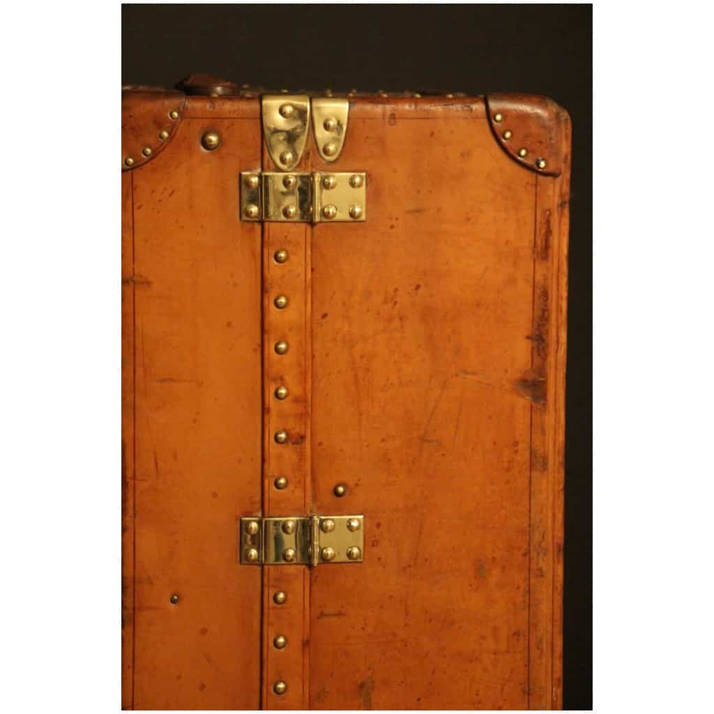 Louis Vuitton leather wardrobe trunk - Les Puces de Paris Saint-Ouen