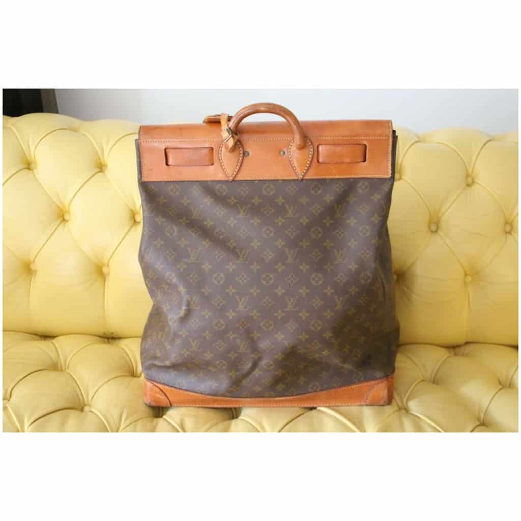 LOUIS VUITTON STEAMER BAG, a collector's piece, monogram canvas with tan  leather base, trims and handle, gold tone hardware, with tag, 45cm x 20cm x  52cm H and a Louis Vuitton Poids