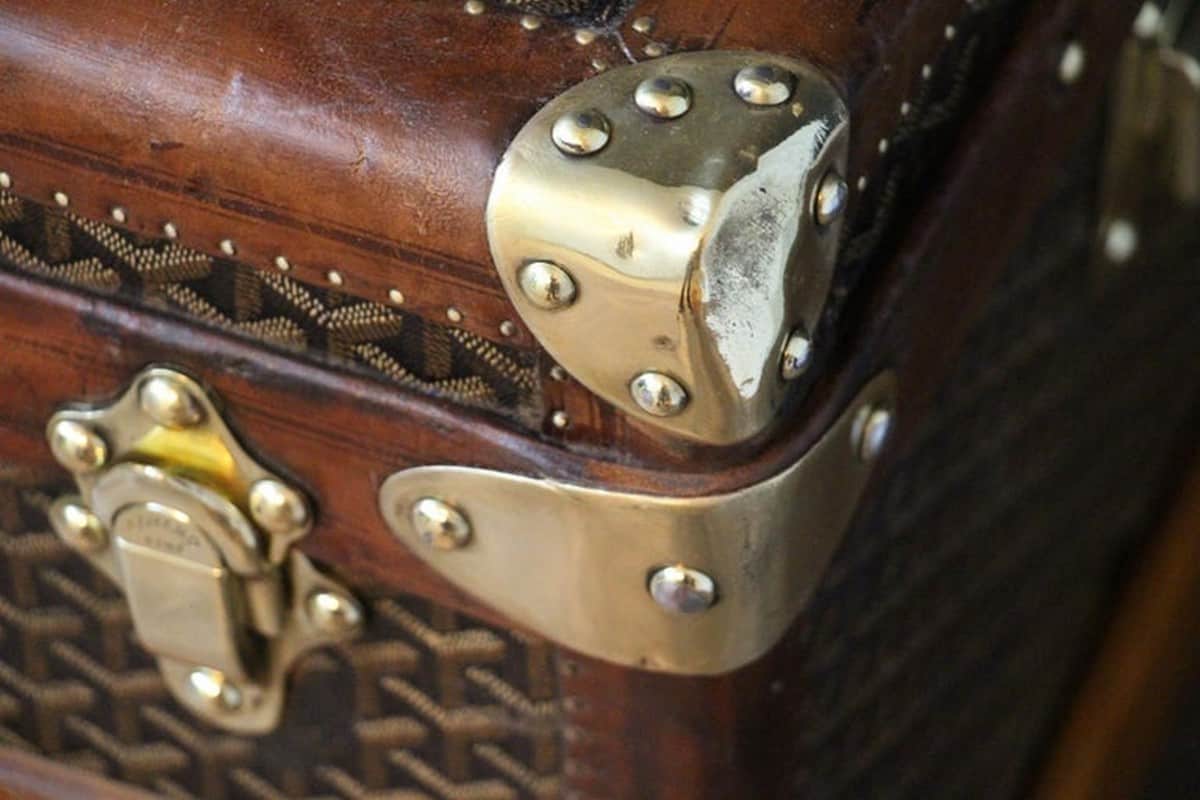 Leather Goyard steamer trunk with key