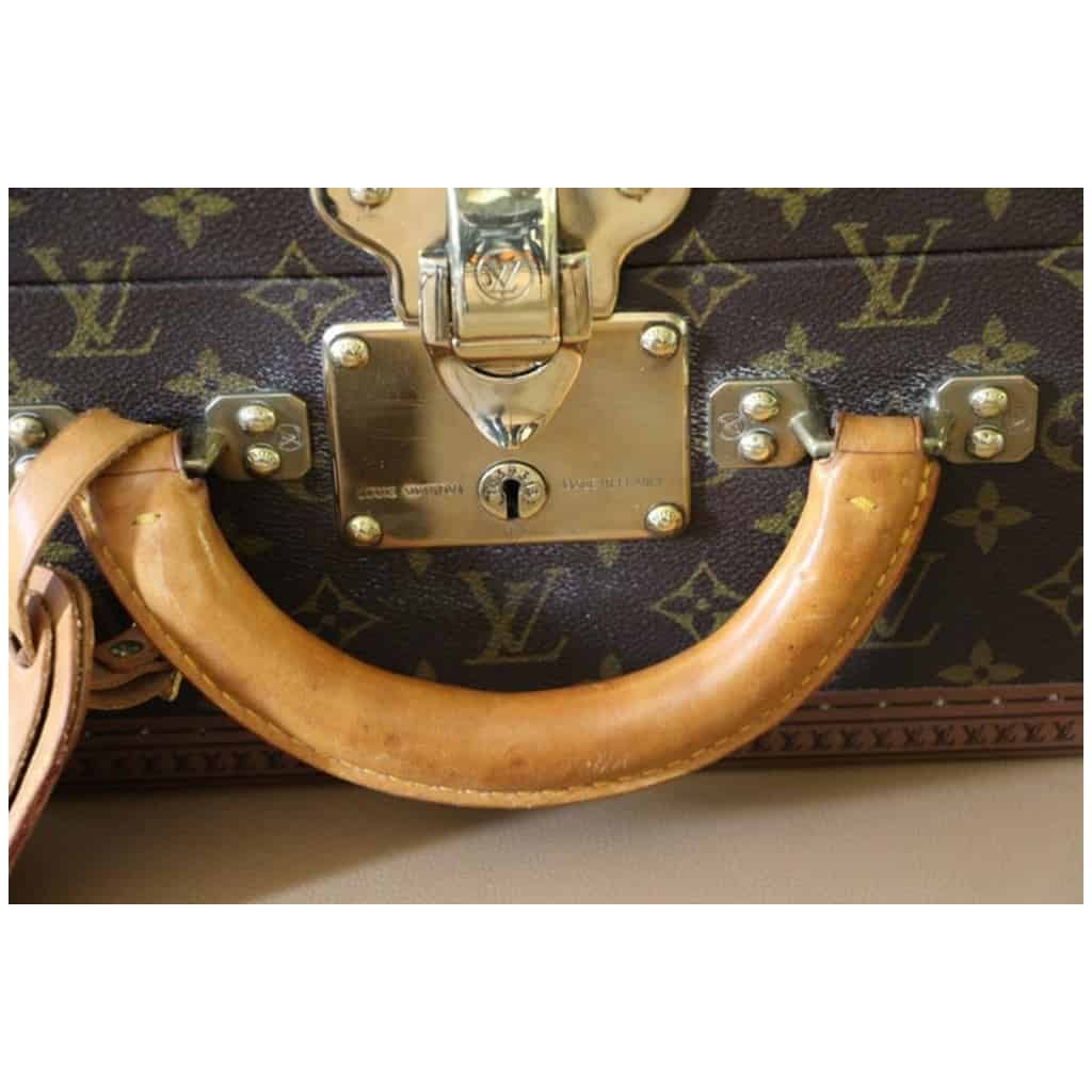 Suitcase Louis Vuitton Alzer 60 cm - Les Puces de Paris Saint-Ouen