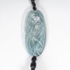 1919 René Lalique – Pendentif Figurine Drapée Verre Blanc Patiné Bleu 8